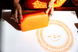 世界中に笑顔を広げるRIEの「太陽」の金運財布